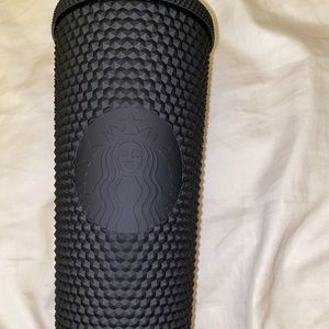 Starbucks tumbler.